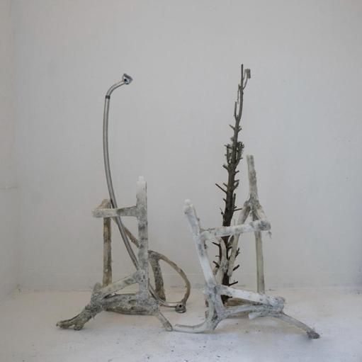 Hug is a language for the place · Two Bikes for Planting · wax、fiber-glass、abandoned christmas tree and metal bar · 15x31x48 · 2022